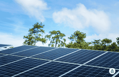 close-up of solar panels against a cloudy sky